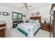 Guest bedroom with a queen-size bed and dresser at 1505 Fireside St, Port Charlotte, FL 33952