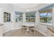 Kitchen nook with a small table and chairs overlooking the pool at 152 Sportsman Rd, Rotonda West, FL 33947