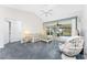 Living room with sliding doors that lead to the pool area at 152 Sportsman Rd, Rotonda West, FL 33947