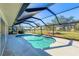 Inviting kidney-shaped pool with screened enclosure at 152 Sportsman Rd, Rotonda West, FL 33947