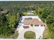 Aerial view of house, pool, and surrounding area at 1600 Thomas St, Englewood, FL 34223