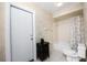 Bathroom with tub, shower, and a small vanity at 1600 Thomas St, Englewood, FL 34223