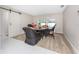 Dining room with sliding doors leading to the pool area at 1600 Thomas St, Englewood, FL 34223