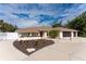 House exterior featuring landscaping and driveway at 1600 Thomas St, Englewood, FL 34223