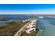 An aerial view of the condo community on the waterfront with easy access to a bridge at 1701 Beach Rd # 404, Englewood, FL 34223