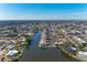 Aerial view of community with water access and lush landscaping at 1783 Lake Pl # 1783A, Venice, FL 34293