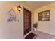 Inviting entryway with a charming welcome sign at 1783 Lake Pl # 1783A, Venice, FL 34293