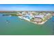 Aerial view of waterfront home and surrounding canals at 1901 Illinois Ave, Englewood, FL 34224