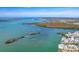 Wide aerial view showcasing the property's waterfront setting at 1901 Illinois Ave, Englewood, FL 34224