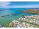 Aerial view of waterfront home nestled in a community of similar homes at 1901 Illinois Ave, Englewood, FL 34224