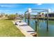 Private dock with lift for easy boat access at 1901 Illinois Ave, Englewood, FL 34224