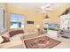 Relaxing Gathering room featuring comfortable seating and built-in shelving at 1901 Illinois Ave, Englewood, FL 34224