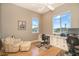 Home office with built-in cabinetry and hardwood floors at 1901 Illinois Ave, Englewood, FL 34224