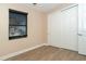 Well-lit bedroom with large closet and window overlooking the backyard at 214 W Pine Valley Ln, Rotonda West, FL 33947