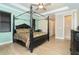 Elegant main bedroom featuring a king-size bed and ample closet space at 214 W Pine Valley Ln, Rotonda West, FL 33947