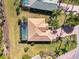 Bird's-eye view of a single-Gathering home with a pool and fenced backyard at 2619 Myakka Marsh Ln, Port Charlotte, FL 33953