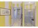 Bathroom with shower and access to other rooms at 2619 Myakka Marsh Ln, Port Charlotte, FL 33953