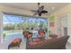 Relaxing covered patio overlooking the pool and lush landscape at 2619 Myakka Marsh Ln, Port Charlotte, FL 33953