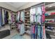 Large walk-in closet with ample shelving and hanging space at 26744 Weiskopf Dr, Englewood, FL 34223