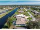 Aerial view of home highlighting backyard oasis at 276 Long Meadow Ln, Rotonda West, FL 33947