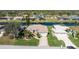 Aerial perspective of home and surrounding neighborhood at 276 Long Meadow Ln, Rotonda West, FL 33947