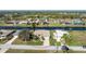 Aerial view of single-Gathering home with canal views at 276 Long Meadow Ln, Rotonda West, FL 33947