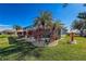 Relaxing pool area with lush landscaping and screened enclosure at 276 Long Meadow Ln, Rotonda West, FL 33947