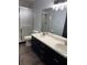 Bathroom with double vanity and shower stall at 294 Rotonda Cir, Rotonda West, FL 33947