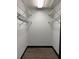 Large walk-in closet with wire shelving at 294 Rotonda Cir, Rotonda West, FL 33947