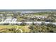 Aerial view of Riverwood community, showcasing its location near water and golf course at 3353 Grand Vista Ct # 202, Port Charlotte, FL 33953