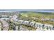 Aerial view of community with preserve and water views at 3353 Grand Vista Ct # 202, Port Charlotte, FL 33953