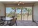 Spacious lanai with seating area and stunning golf course views at 3353 Grand Vista Ct # 202, Port Charlotte, FL 33953