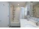 Bathroom with tub shower and updated vanity at 367 Englewood Isles Pkwy # 4, Englewood, FL 34223