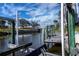 Direct access to the canal with a private dock and lift at 367 Englewood Isles Pkwy # 4, Englewood, FL 34223