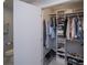 Well-organized walk-in closet with ample shelving and hanging space at 367 Englewood Isles Pkwy # 4, Englewood, FL 34223