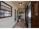 Bright and airy entry with a view into the home from the screened porch at 367 Englewood Isles Pkwy # 4, Englewood, FL 34223