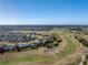 Aerial view showcasing the golf course community with meticulously maintained grounds at 40 Bunker Pl, Rotonda West, FL 33947