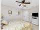 Bedroom featuring a bed, ceiling fan, a dresser, and neutral carpet at 40 Bunker Pl, Rotonda West, FL 33947