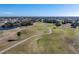 Scenic aerial view of the golf course with winding cart paths and lush fairways at 40 Bunker Pl, Rotonda West, FL 33947