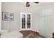 Office featuring hardwood floors, French doors, and ample storage at 40 Bunker Pl, Rotonda West, FL 33947