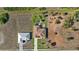 Aerial view showing two houses and surrounding lots at 411 Boundary Blvd, Rotonda West, FL 33947