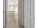 Elegant bathroom with a large soaking tub and glass block feature wall at 411 Boundary Blvd, Rotonda West, FL 33947