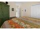 Charming bedroom with a floral bedspread and ample closet space at 411 Boundary Blvd, Rotonda West, FL 33947