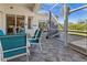 Screened patio and seating area with backyard view at 411 Boundary Blvd, Rotonda West, FL 33947