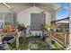 Lush potting area inside a screened enclosure at 411 Boundary Blvd, Rotonda West, FL 33947