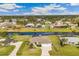 Stunning aerial view of canal-front home and neighborhood at 497 Rotonda Cir, Rotonda West, FL 33947