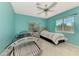 Bedroom with an unusual tanning bed. Large windows allow for lots of natural light at 52 Marker Rd, Rotonda West, FL 33947