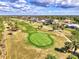 Scenic aerial view of the well-maintained golf course, perfect for golf enthusiasts at 52 Marker Rd, Rotonda West, FL 33947