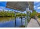 Private boat dock with covered lift and walkway at 5292 Early Ter, Port Charlotte, FL 33981