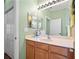 Light and bright bathroom with double vanity at 5560 Club View Ln, North Port, FL 34287